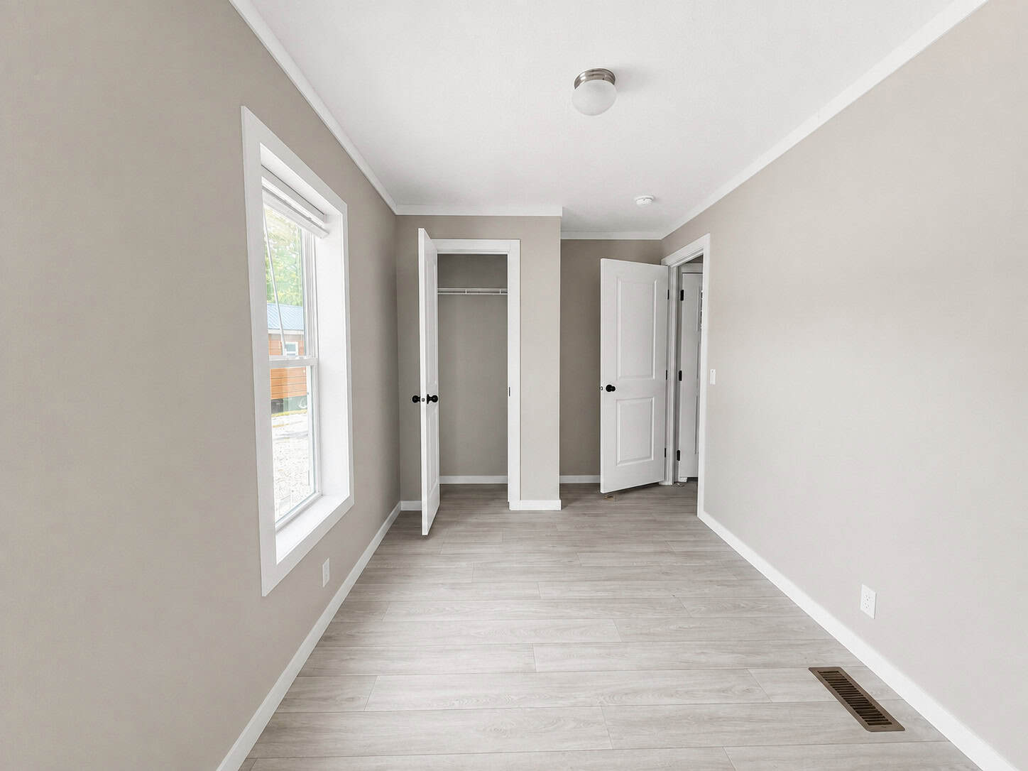 Tiny Life Urban bedroom with open closet