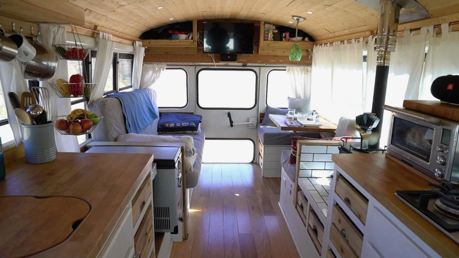 Two Years in Their Cozy Bus Conversion with a Wood Stove 2