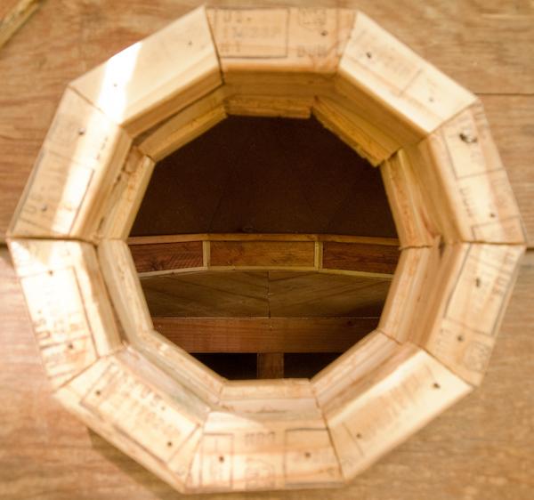 Window Peeks into Sleeping Loft Inside Tiny Dome Cabin