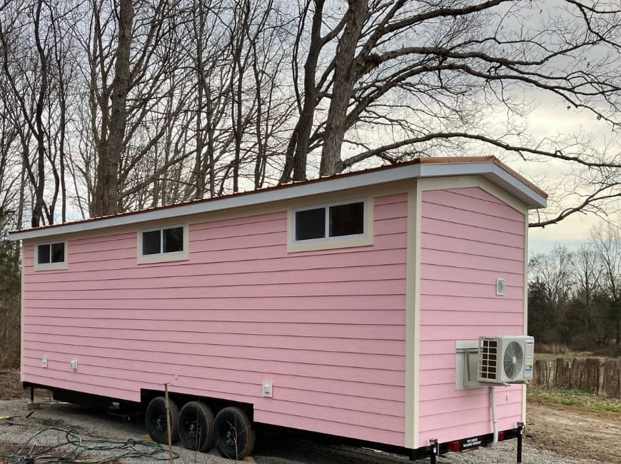 The Woodstock pink tiny house exterior — Tiny House Building Company