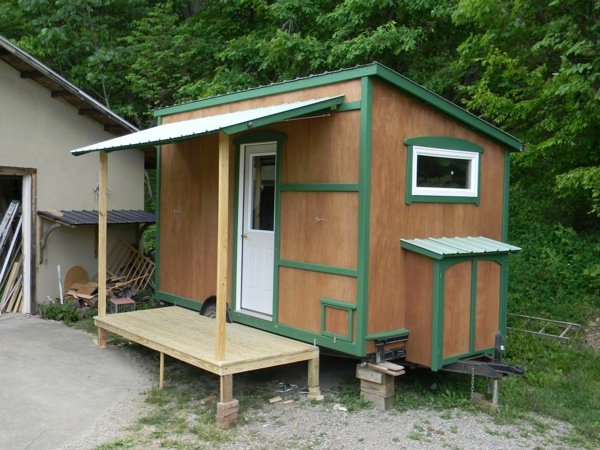 112 square feet Off Grid Tiny House with Folding Porch Roof