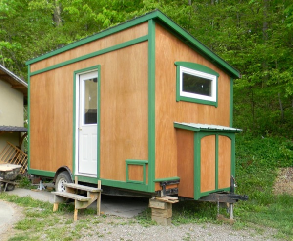 112 square feet Off Grid Tiny House with Folding Porch Roof